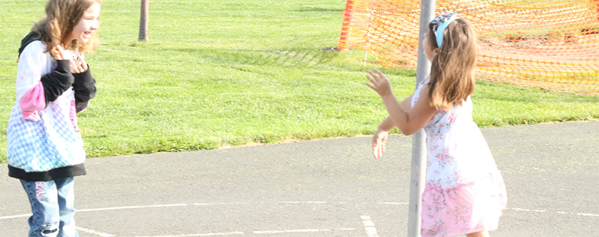 KIDS PLAYING TETHERBALL